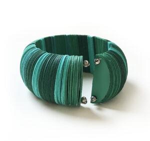 Green-colored circle bracelet of various shades handmade with precious paper
