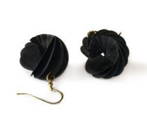 Black pendant earrings in the shape of a spiral